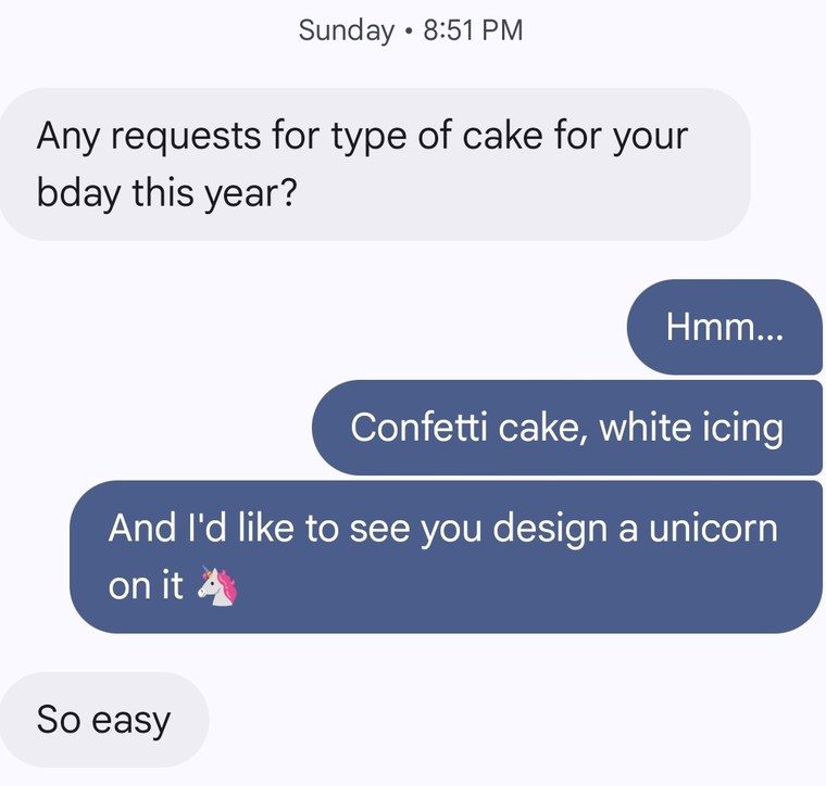 Screenshot of the text exchange. Meredith asks what cake he wants; he asks for confetti cake with white icing and a unicorn; Meredith replies, So easy.